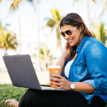 woman with coffee and laptop